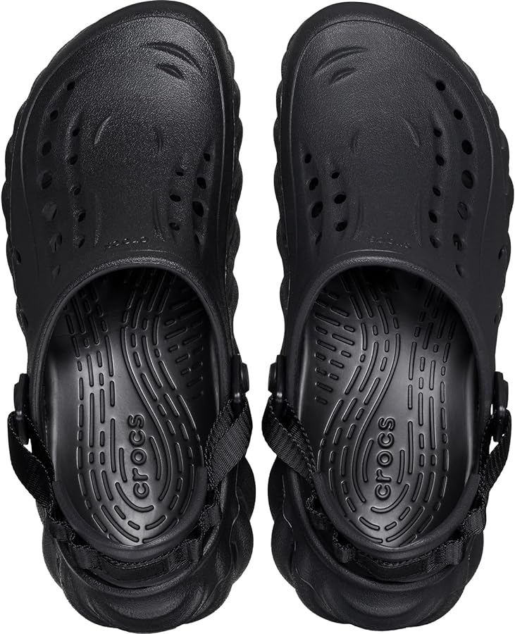 Sabots noirs Crocs futuristes avec sangle ajustable et design aéré Electroshopdakar
