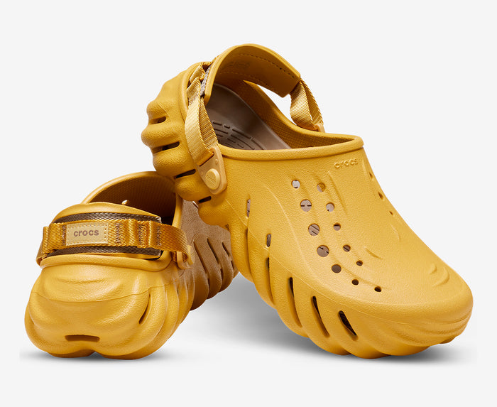 Sabots noirs Crocs futuristes avec sangle ajustable et design aéré Electroshopdakar