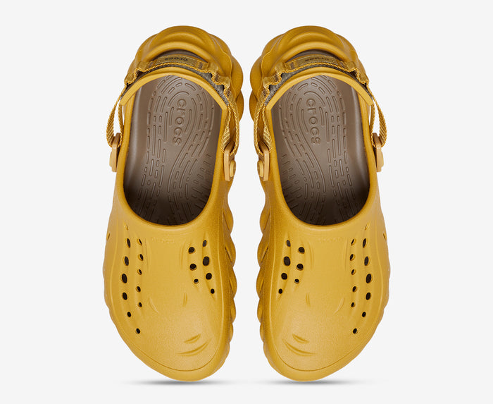 Sabots noirs Crocs futuristes avec sangle ajustable et design aéré Electroshopdakar