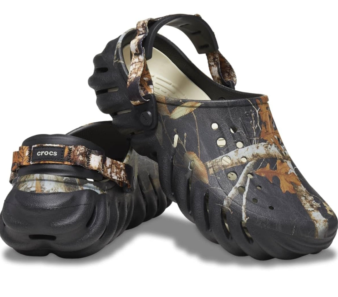 Sabots noirs Crocs futuristes avec sangle ajustable et design aéré Electroshopdakar